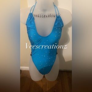 A creation sewn by me, blue onesie with rhinestones